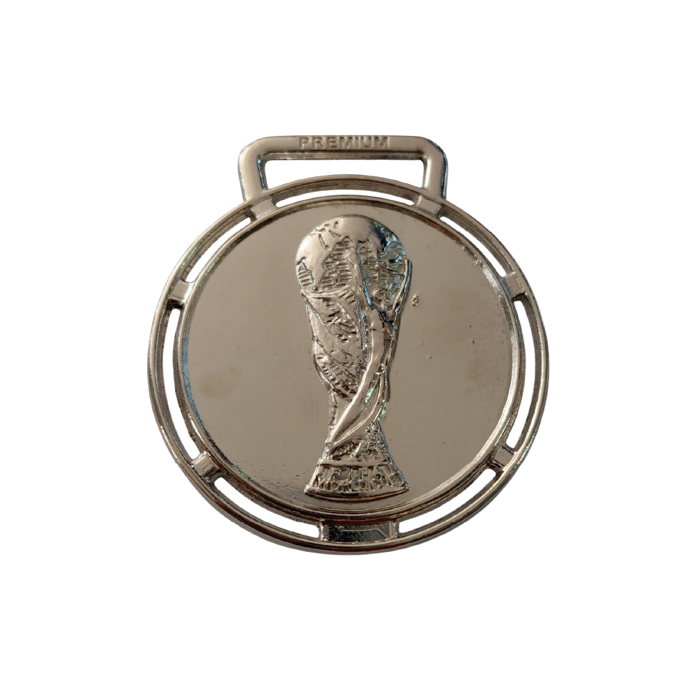 Medalla plata copa del mundo circular con relieve
